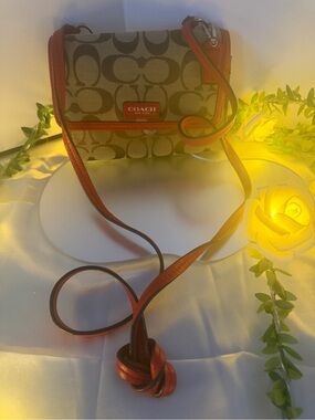 Coach Signature Canvas Crossbody with orange Trim